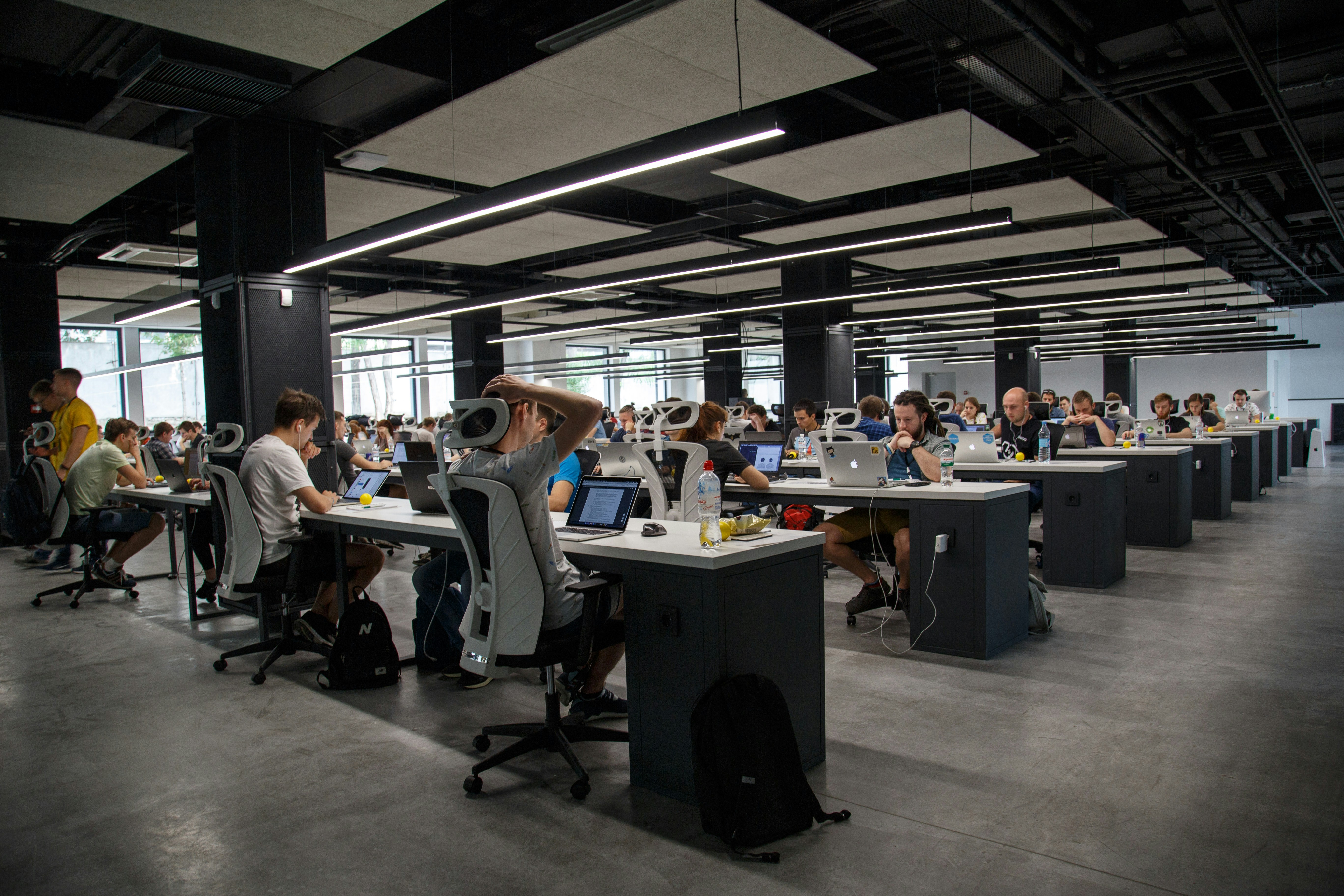Professional team collaborating in modern office environment